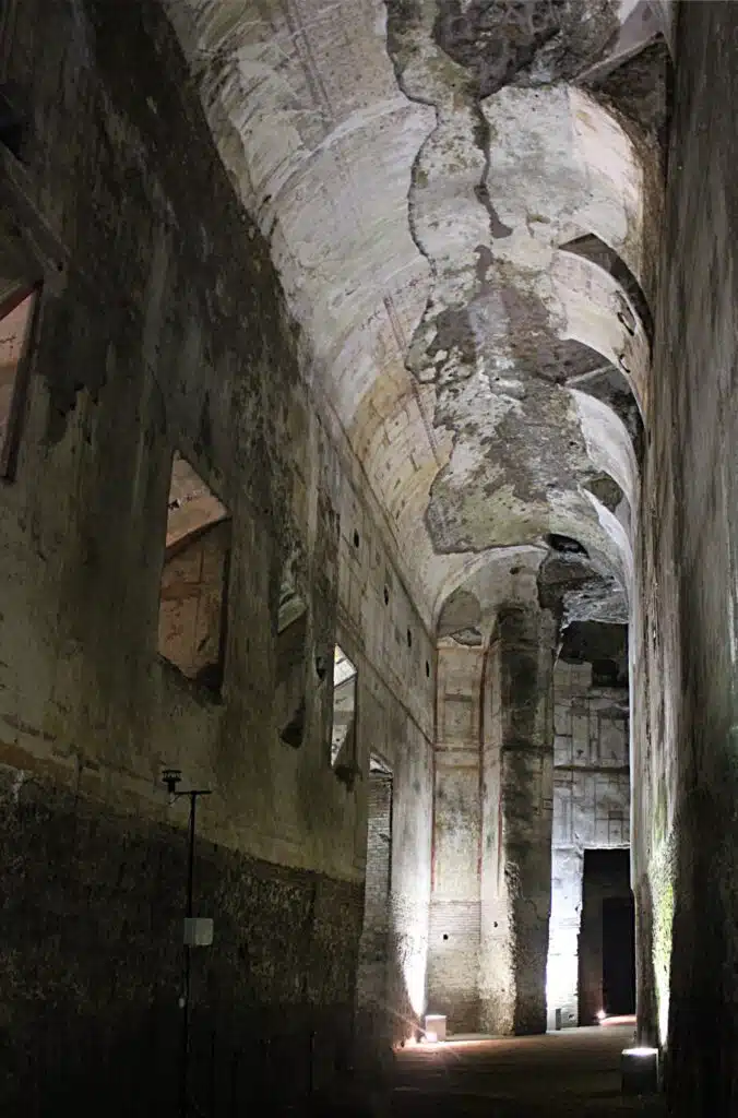 Vaulted corridor inside Nero’s Domus Aurea in Rome, showing ancient wall paintings that inspired the grotesque style.