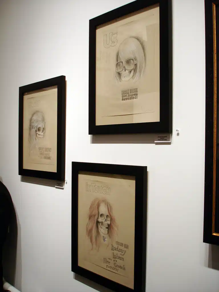 Pop Surrealism skeletal celebrity drawings framed on exhibition wall at Corey Helford Gallery.