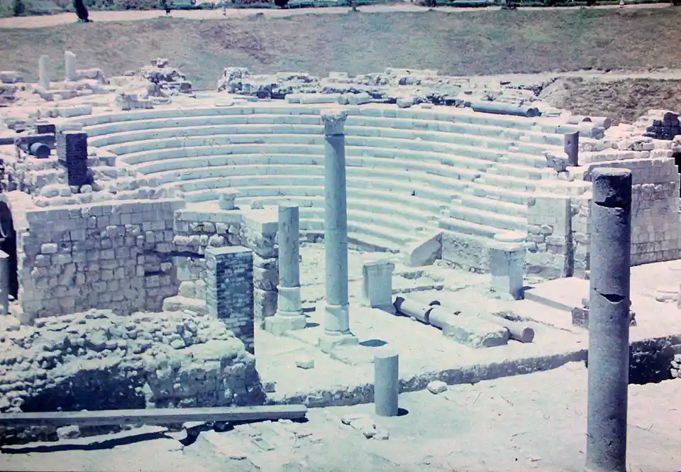 Alexandria Roman amphitheater ruins with semicircular stone seating, illustrating the architectural foundations of Hellenistic art and style.